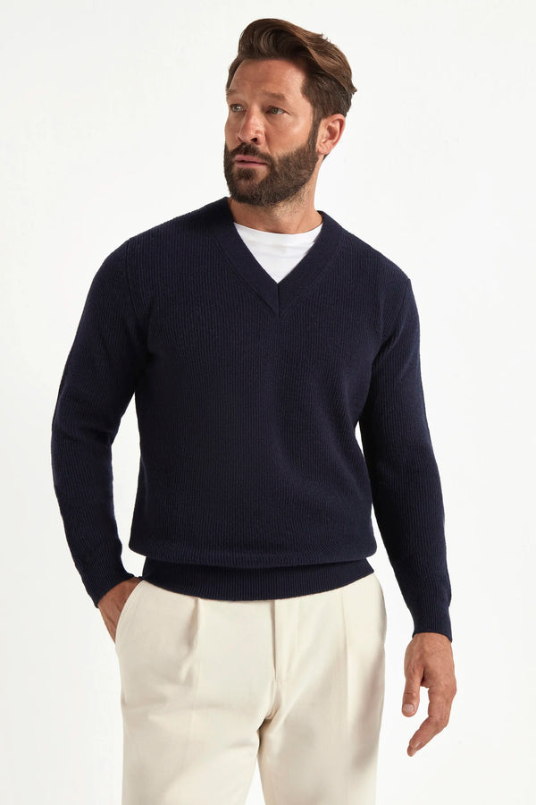 blue ribbed v neck sweater, men's v neck sweater, italian wool sweater, blue wool v neck, luxury men's sweater, elegant men's sweater, refined v neck sweater, tailored blue sweater, premium italian sweater, sophisticated men's knitwear, timeless italian sweater, upscale men's sweater, classic blue v neck, italian craftsmanship sweater, premium men's wool sweater, refined italian v neck sweater