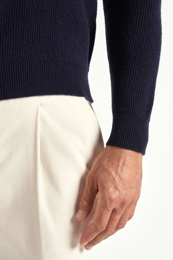 blue ribbed v neck sweater, men's v neck sweater, italian wool sweater, blue wool v neck, luxury men's sweater, elegant men's sweater, refined v neck sweater, tailored blue sweater, premium italian sweater, sophisticated men's knitwear, timeless italian sweater, upscale men's sweater, classic blue v neck, italian craftsmanship sweater, premium men's wool sweater, refined italian v neck sweater