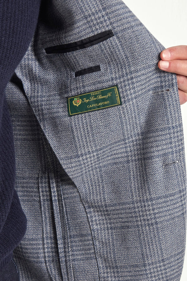 dusty blue prince of wales jacket, men's prince of wales jacket, italian wool jacket, blue patterned jacket, luxury men's jacket, elegant men's blazer, refined prince of wales jacket, tailored dusty blue jacket, premium italian jacket, sophisticated men's blazer, timeless italian jacket, upscale men's blazer, classic prince of wales jacket, italian craftsmanship blazer, premium men's wool blazer, refined italian jacket