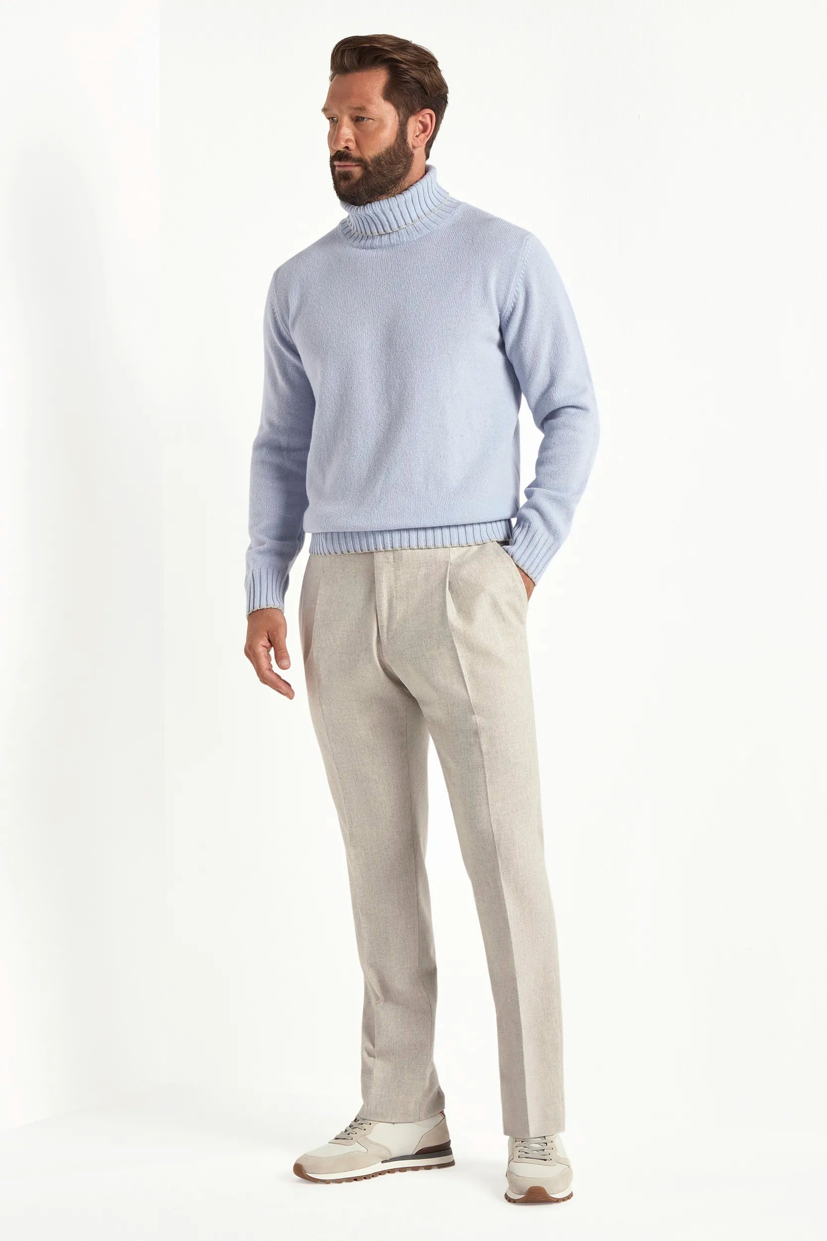 light blue wool turtleneck, italian style, made in italy, fine wool turtleneck, luxury wool sweater, elegant winter knitwear, refined menswear turtleneck, premium italian sweater, versatile layering turtleneck, tailored wool turtleneck, breathable winter sweater, soft wool knitwear, upscale wool sweater, italian craftsmanship turtleneck, polished winter knit, classic light blue turtleneck, timeless italian sweater, sophisticated wool knit, cozy winter wool sweater, lightweight wool turtleneck