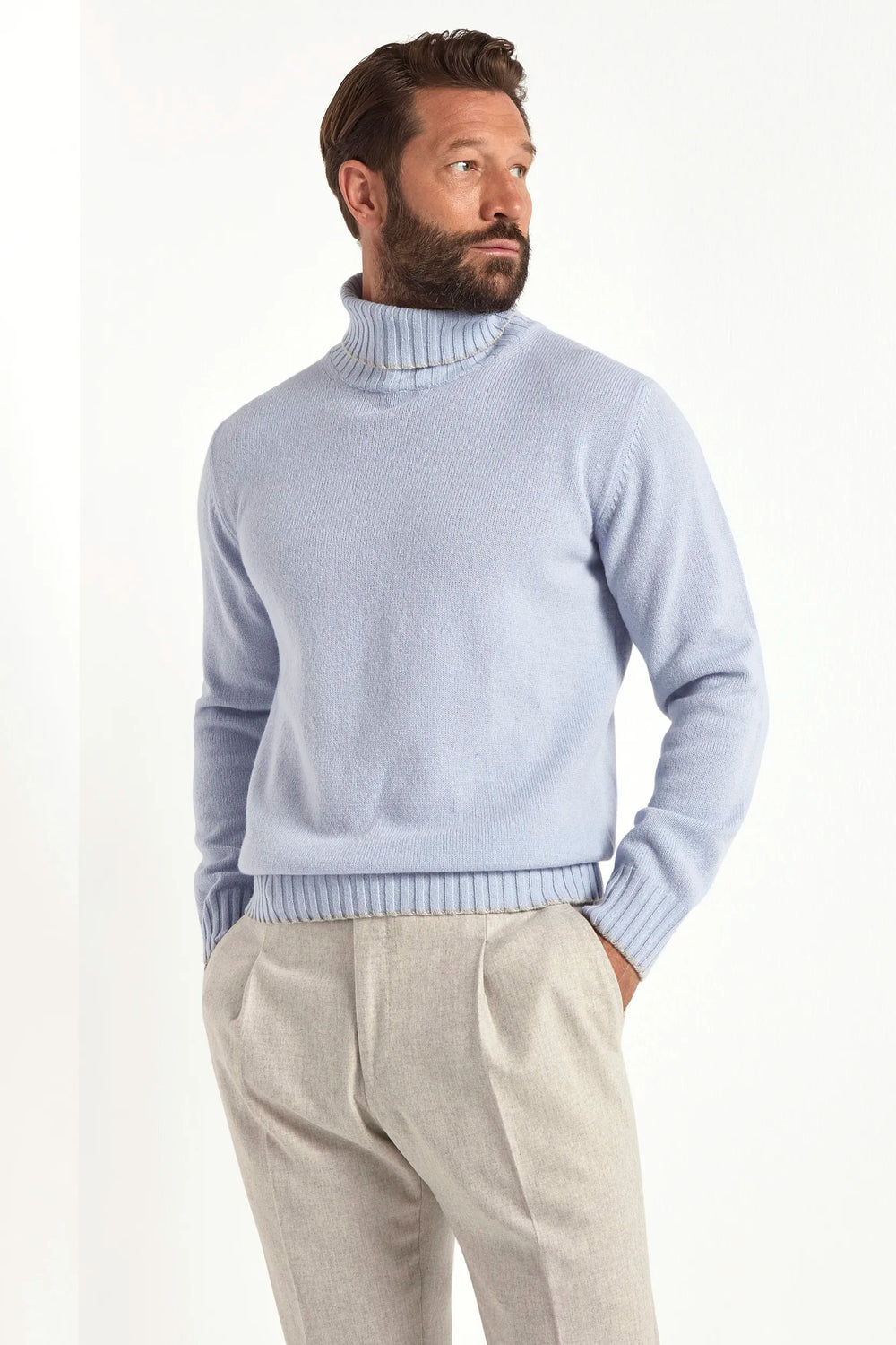 light blue wool turtleneck, italian style, made in italy, fine wool turtleneck, luxury wool sweater, elegant winter knitwear, refined menswear turtleneck, premium italian sweater, versatile layering turtleneck, tailored wool turtleneck, breathable winter sweater, soft wool knitwear, upscale wool sweater, italian craftsmanship turtleneck, polished winter knit, classic light blue turtleneck, timeless italian sweater, sophisticated wool knit, cozy winter wool sweater, lightweight wool turtleneck