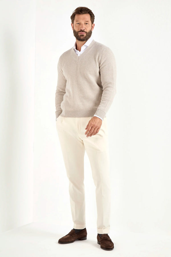 sand ribbed v neck sweater, men's v neck sweater, italian wool sweater, sand wool v neck, luxury men's sweater, elegant men's sweater, refined v neck sweater, tailored sand sweater, premium italian sweater, sophisticated men's knitwear, timeless italian sweater, upscale men's sweater, classic sand v neck, italian craftsmanship sweater, premium men's wool sweater, refined italian v neck sweater