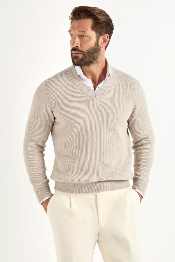 sand ribbed v neck sweater, men's v neck sweater, italian wool sweater, sand wool v neck, luxury men's sweater, elegant men's sweater, refined v neck sweater, tailored sand sweater, premium italian sweater, sophisticated men's knitwear, timeless italian sweater, upscale men's sweater, classic sand v neck, italian craftsmanship sweater, premium men's wool sweater, refined italian v neck sweater