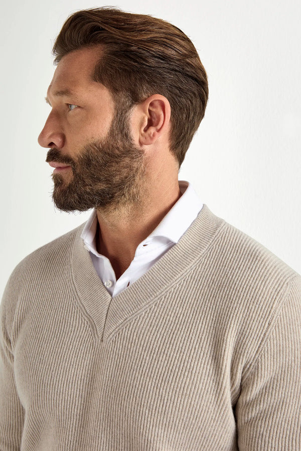 sand ribbed v neck sweater, men's v neck sweater, italian wool sweater, sand wool v neck, luxury men's sweater, elegant men's sweater, refined v neck sweater, tailored sand sweater, premium italian sweater, sophisticated men's knitwear, timeless italian sweater, upscale men's sweater, classic sand v neck, italian craftsmanship sweater, premium men's wool sweater, refined italian v neck sweater