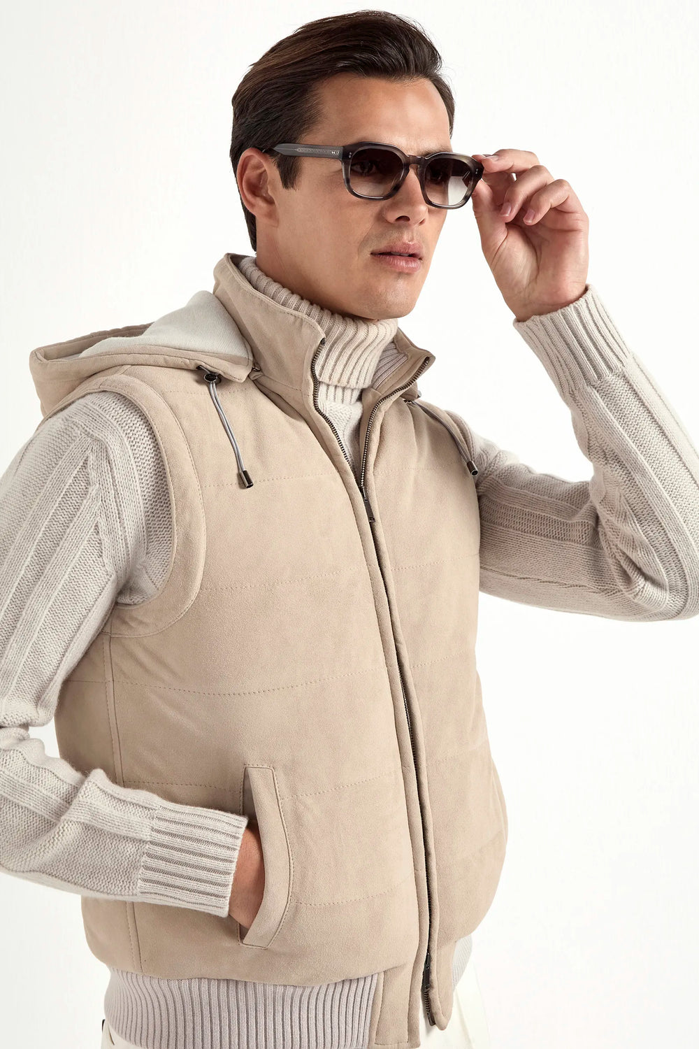taupe suede padded vest, men's suede vest, italian suede vest, taupe padded vest, luxury men's vest, elegant men's vest, refined suede vest, tailored taupe vest, premium italian vest, sophisticated men's vest, timeless italian suede vest, upscale men's vest, classic taupe vest, italian craftsmanship vest, premium men's suede vest, refined italian padded vest