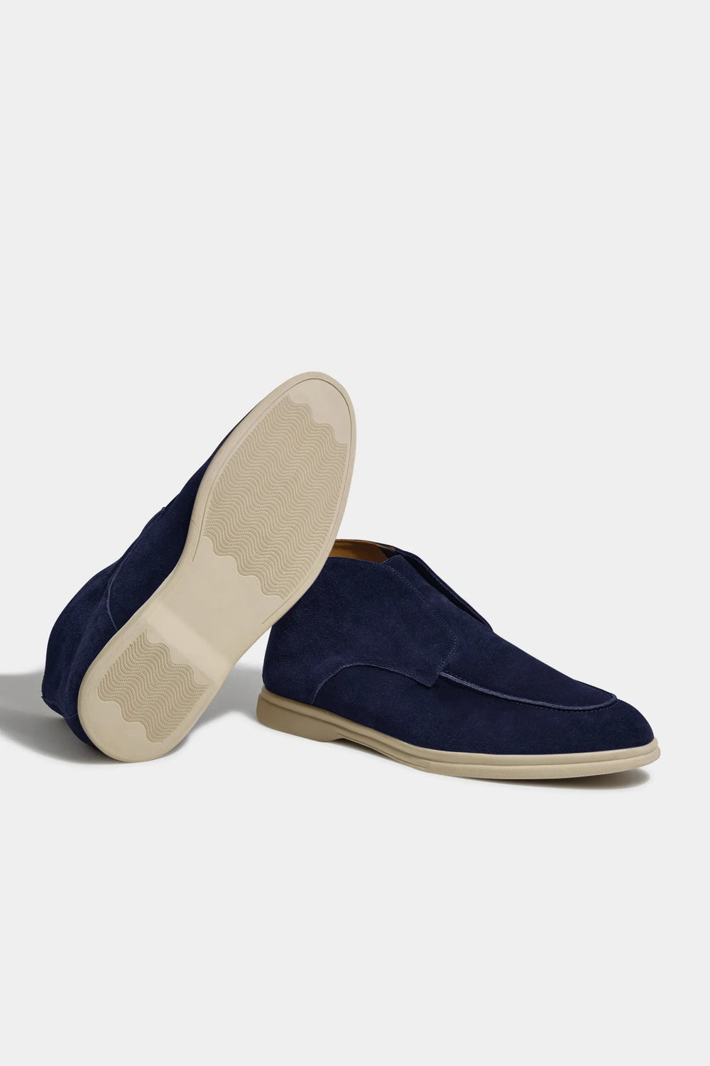 blue polacchino, men suede polacchino, italian suede loafers, blue suede loafers, slip-on suede boot, mid-top suede shoe, made in italy polacchino, luxury suede polacchino, elegant suede footwear, refined italian polacchino, premium suede loafers, soft suede ankle boot, versatile suede shoe, handcrafted italian footwear, timeless polacchino design, comfortable suede loafers, upscale suede shoe, italian craftsmanship polacchino, casual luxury footwear, classic blue suede loafer