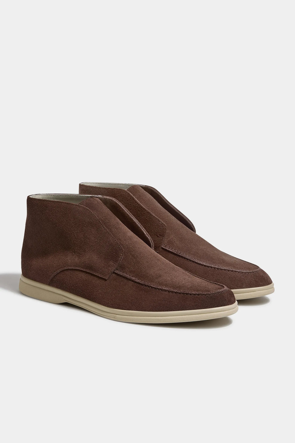 brown polacchino, men suede polacchino, italian suede loafers, brown suede loafers, slip-on suede boot, mid-top suede shoe, made in italy polacchino, luxury suede polacchino, elegant suede footwear, refined italian polacchino, premium suede loafers, soft suede ankle boot, versatile suede shoe, handcrafted italian footwear, timeless polacchino design, comfortable suede loafers, upscale suede shoe, italian craftsmanship polacchino, casual luxury footwear, classic brown suede loafer