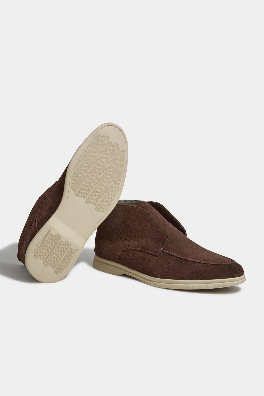 brown polacchino, men suede polacchino, italian suede loafers, brown suede loafers, slip-on suede boot, mid-top suede shoe, made in italy polacchino, luxury suede polacchino, elegant suede footwear, refined italian polacchino, premium suede loafers, soft suede ankle boot, versatile suede shoe, handcrafted italian footwear, timeless polacchino design, comfortable suede loafers, upscale suede shoe, italian craftsmanship polacchino, casual luxury footwear, classic brown suede loafer