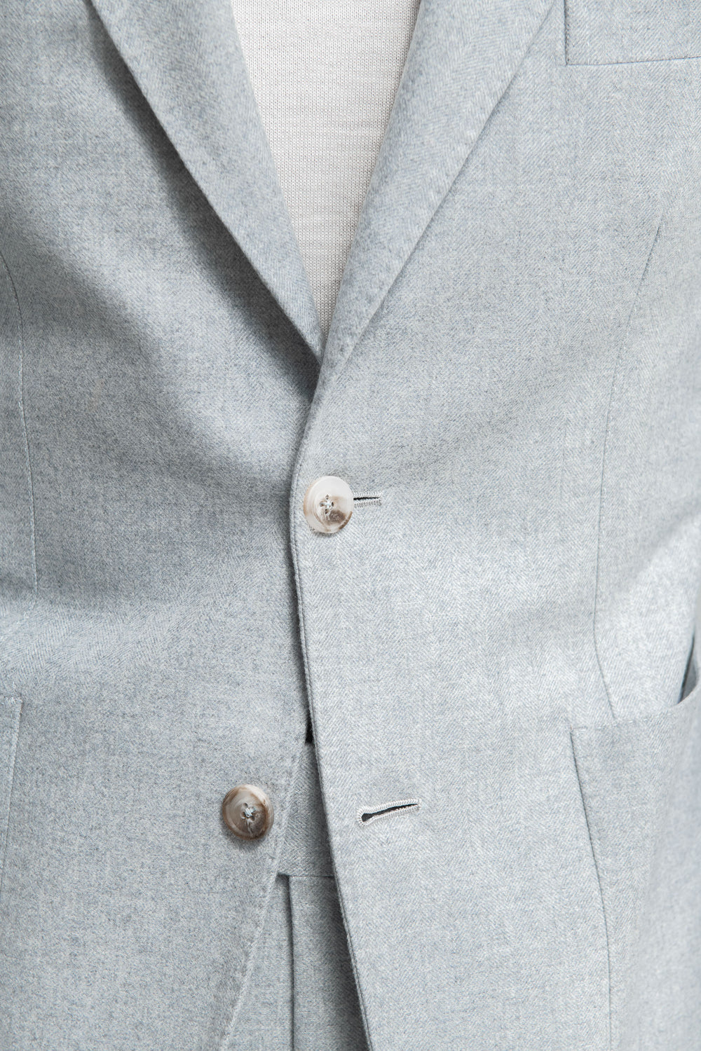 Abito azzurro chiaro a spina di pesce in lana e cashmere – Made in Italy