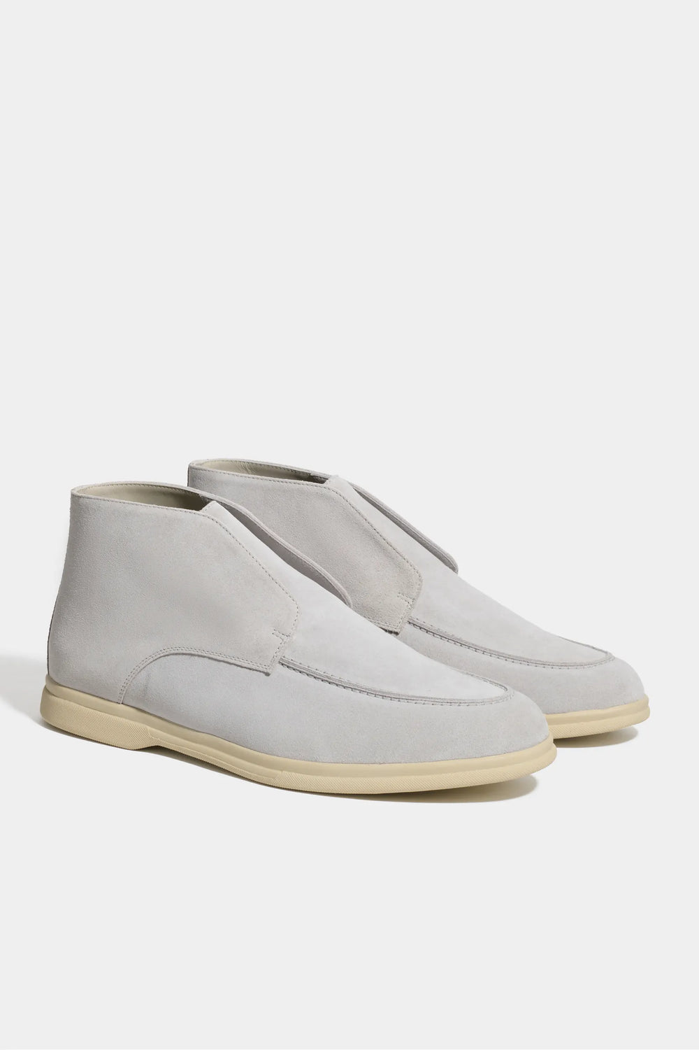 light grey polacchino, men suede polacchino, italian suede loafers, light grey suede loafers, slip-on suede boot, mid-top suede shoe, made in italy polacchino, luxury suede polacchino, elegant suede footwear, refined italian polacchino, premium suede loafers, soft suede ankle boot, versatile suede shoe, handcrafted italian footwear, timeless polacchino design, comfortable suede loafers, upscale suede shoe, italian craftsmanship polacchino, casual luxury footwear, classic light grey suede loafer