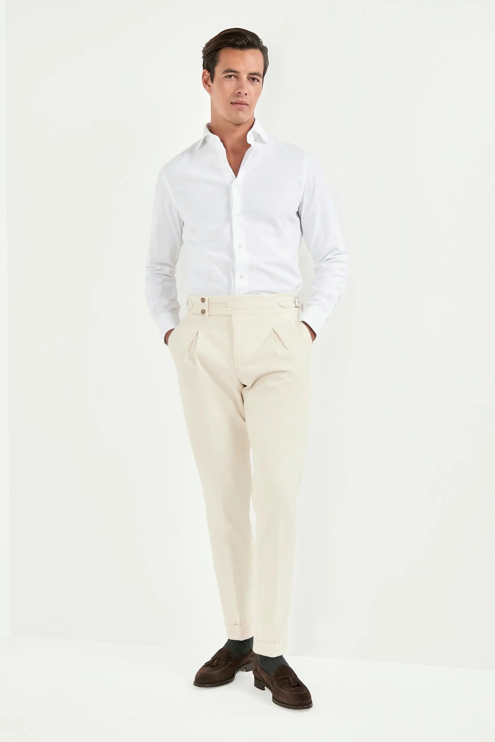 off-white limited edition trousers, men’s tailored trousers, italian wool trousers, off-white smart trousers, limited edition trousers, high-rise slim fit trousers, kissing pleats trousers, side adjusters trousers, large split waistband trousers, elegant men’s trousers, refined italian trousers, luxury off-white trousers, premium italian trousers, hand-finished bespoke trousers, sophisticated men’s trousers, timeless tailored trousers, italian craftsmanship trousers, made in italy trousers, modern tailored
