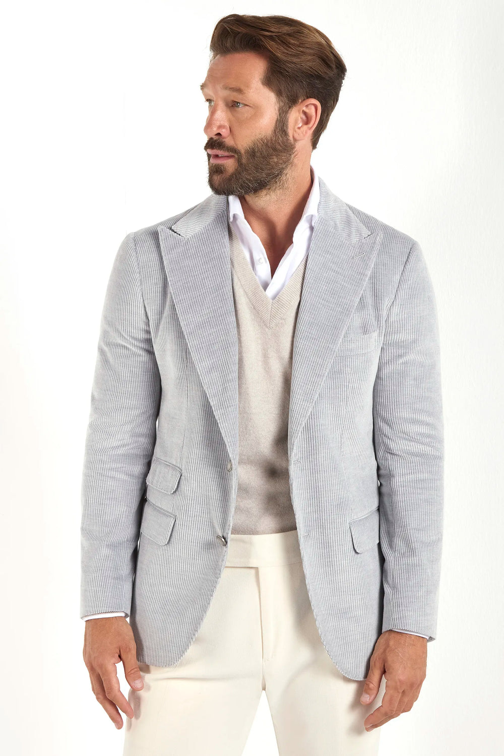 Stone corduroy jacket, Italian style, made in Italy, tailored luxury jacket, elegant menswear piece, refined casual jacket, premium Italian craftsmanship, classic corduroy blazer, sophisticated smart casual jacket, versatile layering piece, polished modern jacket, fine Italian tailoring, upscale menswear jacket, timeless Italian jacket, refined professional look, sharp tailored jacket, luxury casualwear, contemporary corduroy blazer, Italian elegance jacket