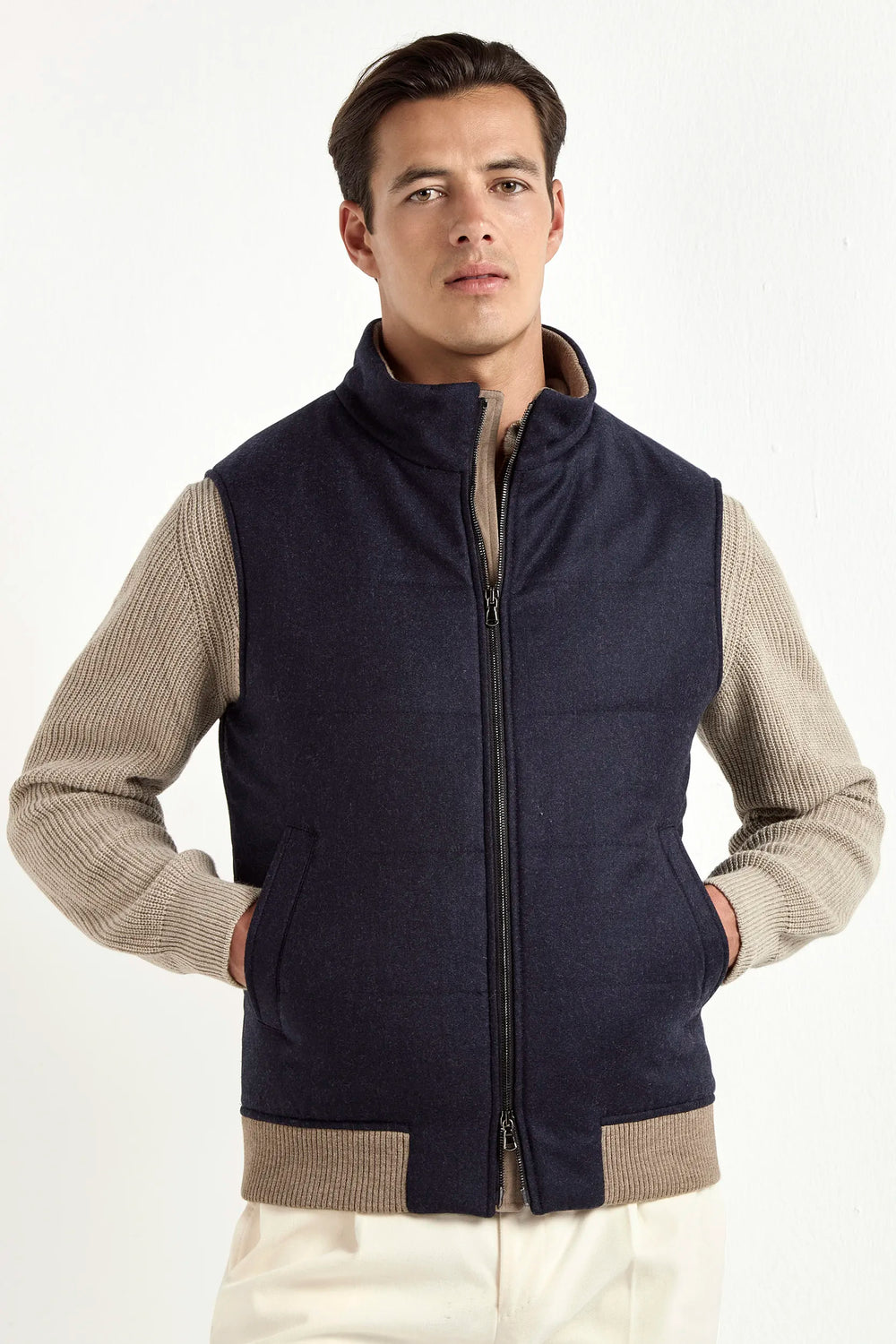 blue down vest, men's wool vest, italian cashmere vest, blue padded vest, luxury men's vest, elegant men's outerwear, refined wool vest, tailored blue vest, premium italian vest, sophisticated men's gilet, timeless italian outerwear, upscale men's vest, classic blue vest, italian craftsmanship vest, premium men's down vest, refined italian wool vest