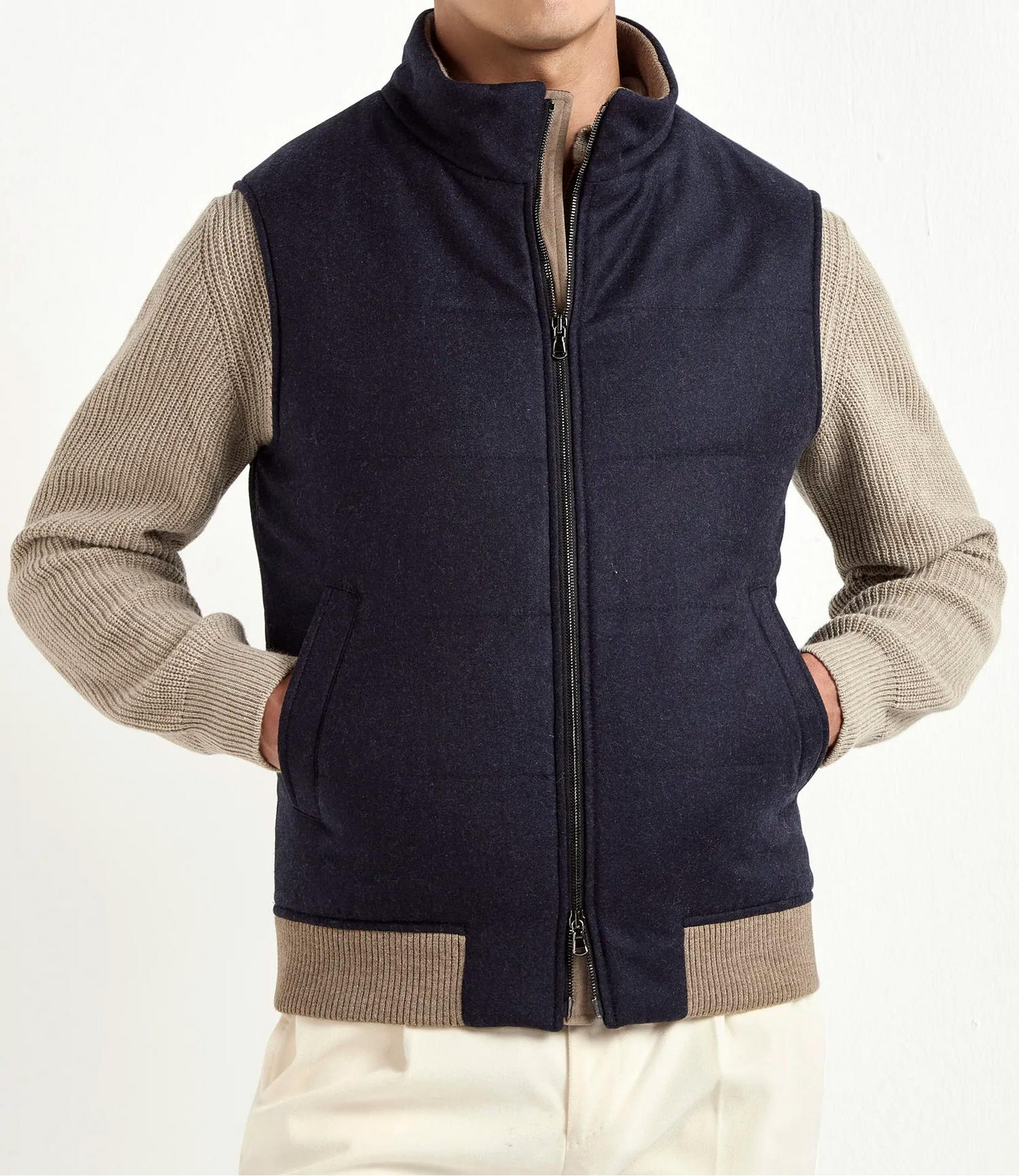 blue down vest, men's wool vest, italian cashmere vest, blue padded vest, luxury men's vest, elegant men's outerwear, refined wool vest, tailored blue vest, premium italian vest, sophisticated men's gilet, timeless italian outerwear, upscale men's vest, classic blue vest, italian craftsmanship vest, premium men's down vest, refined italian wool vest