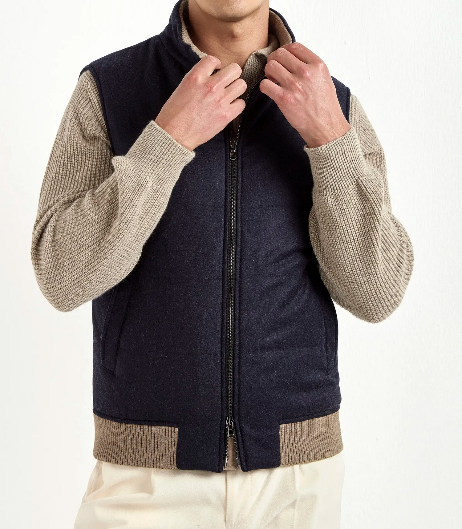 blue down vest, men's wool vest, italian cashmere vest, blue padded vest, luxury men's vest, elegant men's outerwear, refined wool vest, tailored blue vest, premium italian vest, sophisticated men's gilet, timeless italian outerwear, upscale men's vest, classic blue vest, italian craftsmanship vest, premium men's down vest, refined italian wool vest