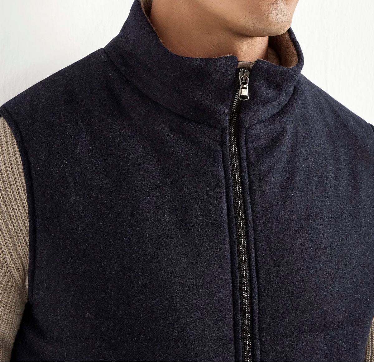 blue down vest, men's wool vest, italian cashmere vest, blue padded vest, luxury men's vest, elegant men's outerwear, refined wool vest, tailored blue vest, premium italian vest, sophisticated men's gilet, timeless italian outerwear, upscale men's vest, classic blue vest, italian craftsmanship vest, premium men's down vest, refined italian wool vest