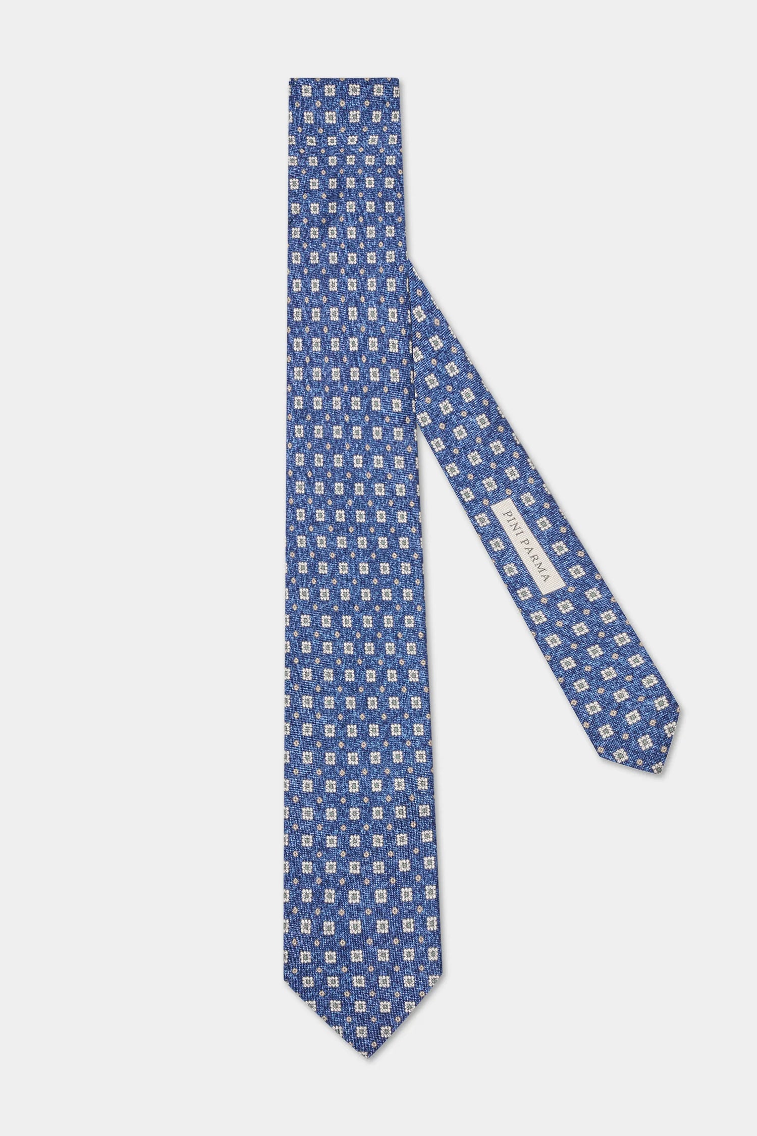 Blue patterned tie on a white background