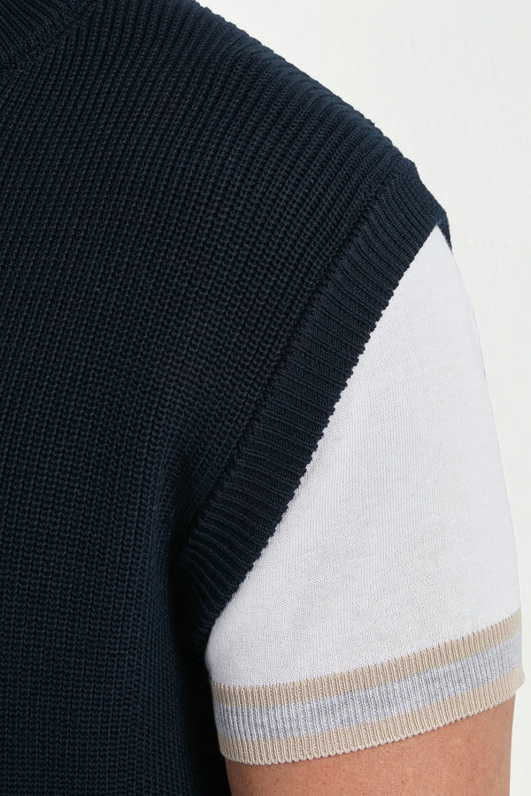 blue knitted vest, men's blue vest, italian knit vest, blue sleeveless knit, luxury men's vest, elegant men's knitwear, refined knitted vest, tailored blue vest, premium italian vest, sophisticated men's knitwear, timeless italian vest, upscale men's sleeveless knit, classic blue vest, italian craftsmanship knit, premium men's knitted vest, refined italian knitwear