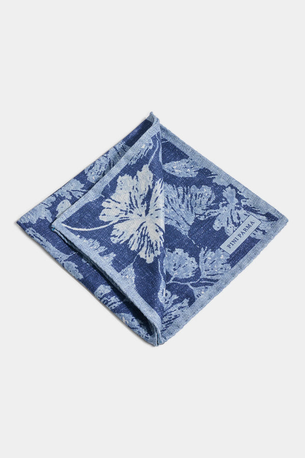 Blue floral patterned napkin on a white background