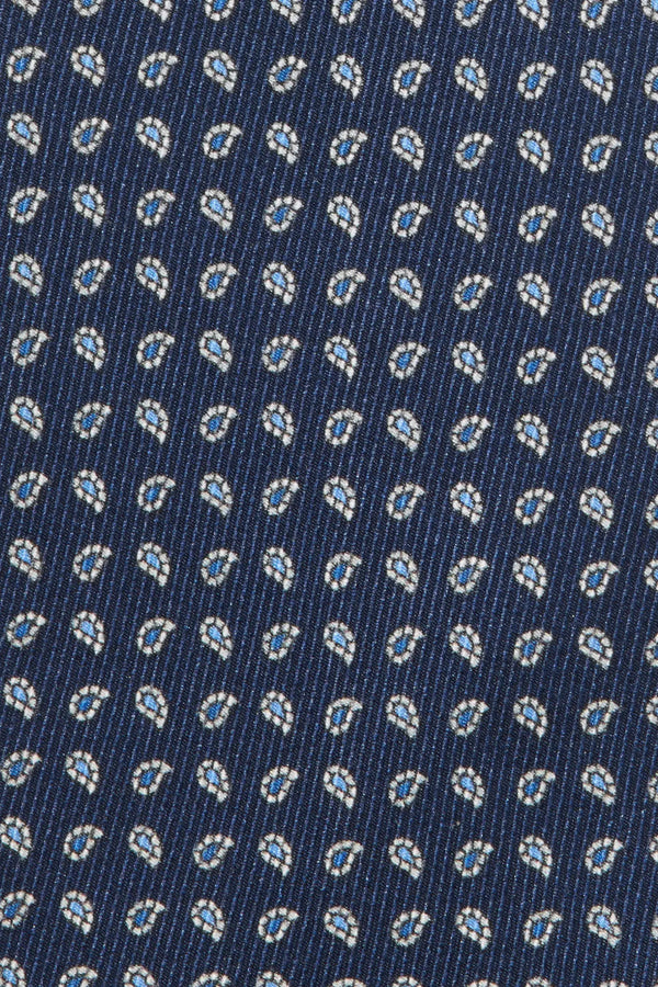 Close-up of a blue fabric with a small pattern
