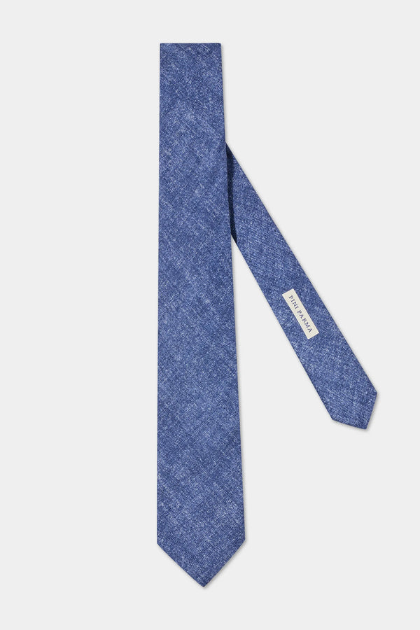 Blue textured tie with a brand label on a white background