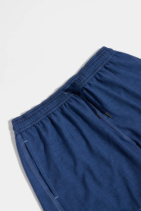 Blue shorts on a light gray background