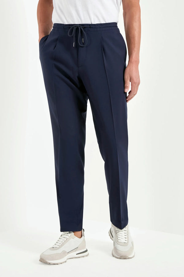 blue travel trousers, men's blue trousers, italian travel pants, blue alassio trousers, luxury men's trousers, elegant men's pants, refined travel trousers, tailored blue trousers, premium italian trousers, sophisticated men's travel pants, timeless italian trousers, upscale men's trousers, classic blue pants, italian craftsmanship trousers, premium men's travel trousers, refined italian alassio trousers