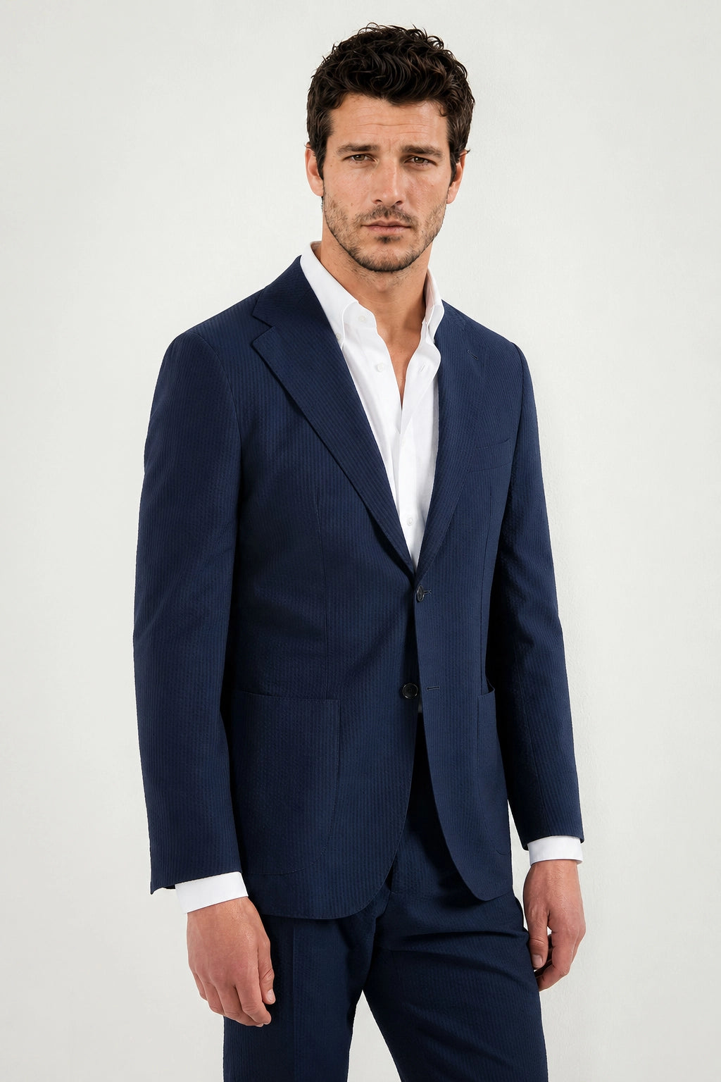 Men Pini Parma single breasted blue suit in seersucker made in italy in wool and silk from Loro Piana 