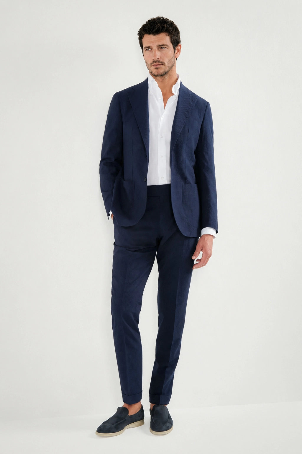 Men Pini Parma single breasted blue suit in seersucker made in italy in wool and silk from Loro Piana 