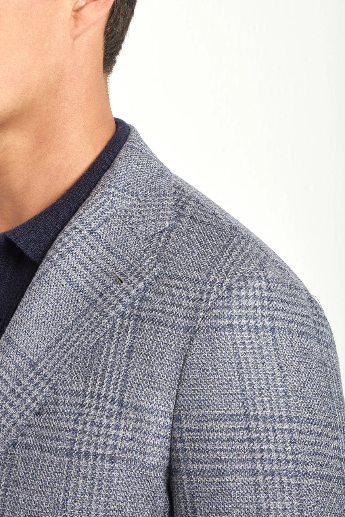 dusty blue prince of wales jacket, men's prince of wales jacket, italian wool jacket, blue patterned jacket, luxury men's jacket, elegant men's blazer, refined prince of wales jacket, tailored dusty blue jacket, premium italian jacket, sophisticated men's blazer, timeless italian jacket, upscale men's blazer, classic prince of wales jacket, italian craftsmanship blazer, premium men's wool blazer, refined italian jacket