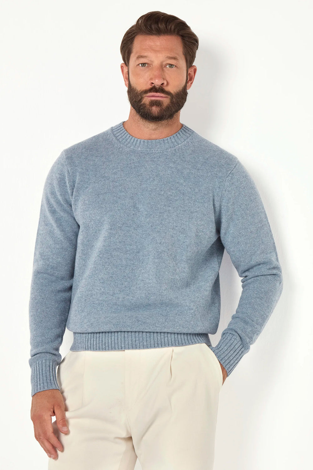 dusty blue merino crewneck, men's merino sweater, italian merino crew, dusty blue wool crewneck, luxury men's sweater, elegant men's crewneck, refined merino sweater, tailored dusty blue crewneck, premium italian sweater, sophisticated men's knitwear, timeless italian crewneck, upscale men's sweater, classic dusty blue crewneck, italian craftsmanship sweater, premium men's merino knit, refined italian crewneck
