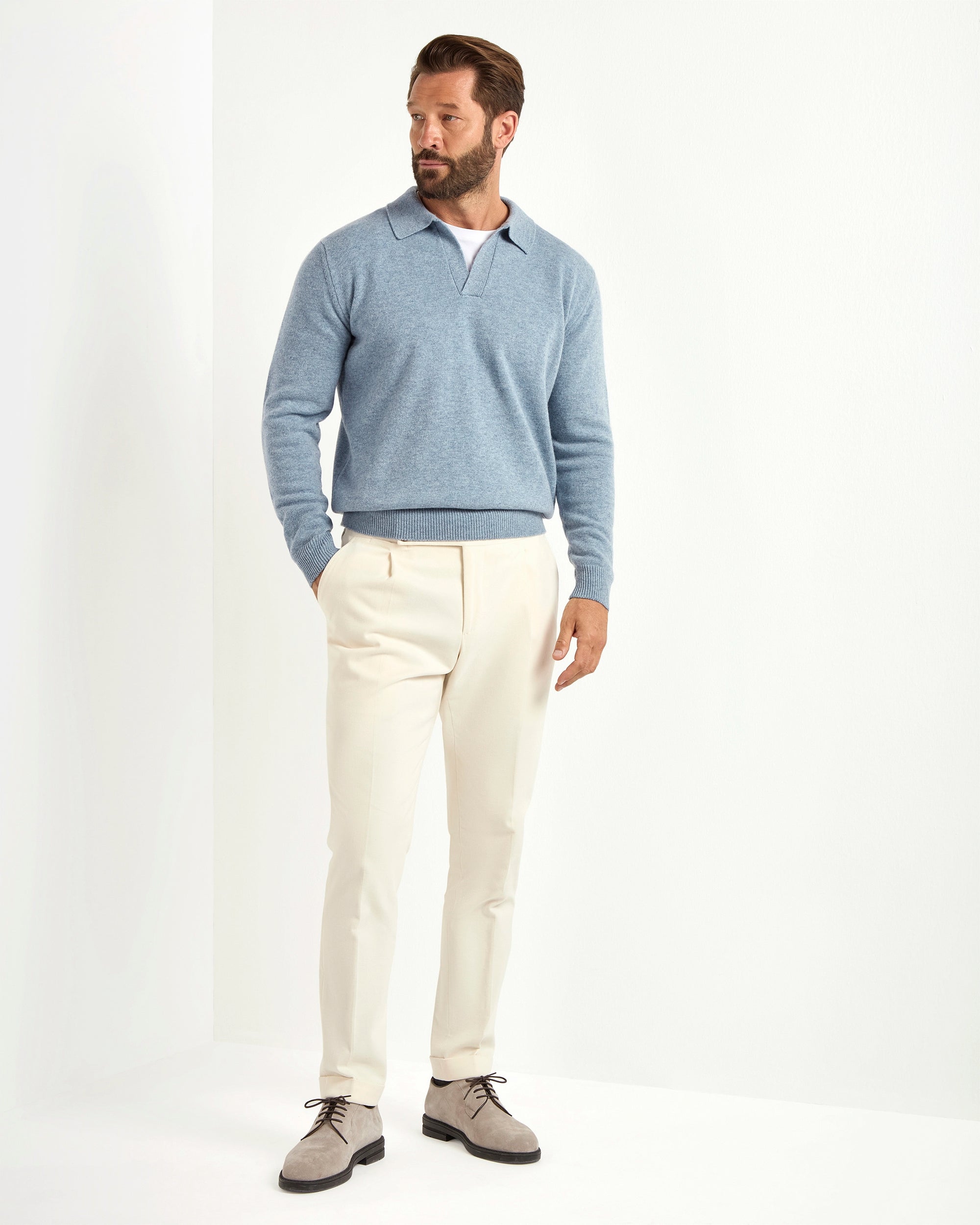 dusty blue wool polo, men's wool polo, italian wool polo, dusty blue knit polo, luxury men's polo, elegant men's polo, refined wool polo, tailored dusty blue polo, premium italian polo, sophisticated men's polo, timeless italian polo, upscale men's polo, classic dusty blue polo, italian craftsmanship polo, premium men's knit polo, refined italian wool polo