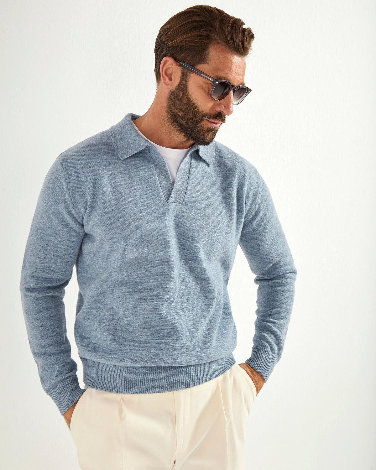 dusty blue wool polo, men's wool polo, italian wool polo, dusty blue knit polo, luxury men's polo, elegant men's polo, refined wool polo, tailored dusty blue polo, premium italian polo, sophisticated men's polo, timeless italian polo, upscale men's polo, classic dusty blue polo, italian craftsmanship polo, premium men's knit polo, refined italian wool polo