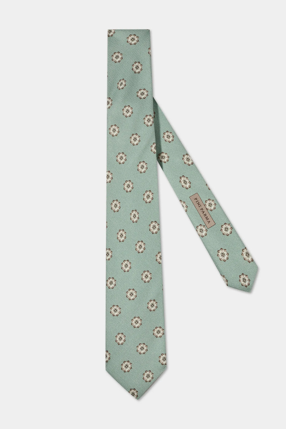 Green floral patterned tie on a light gray background