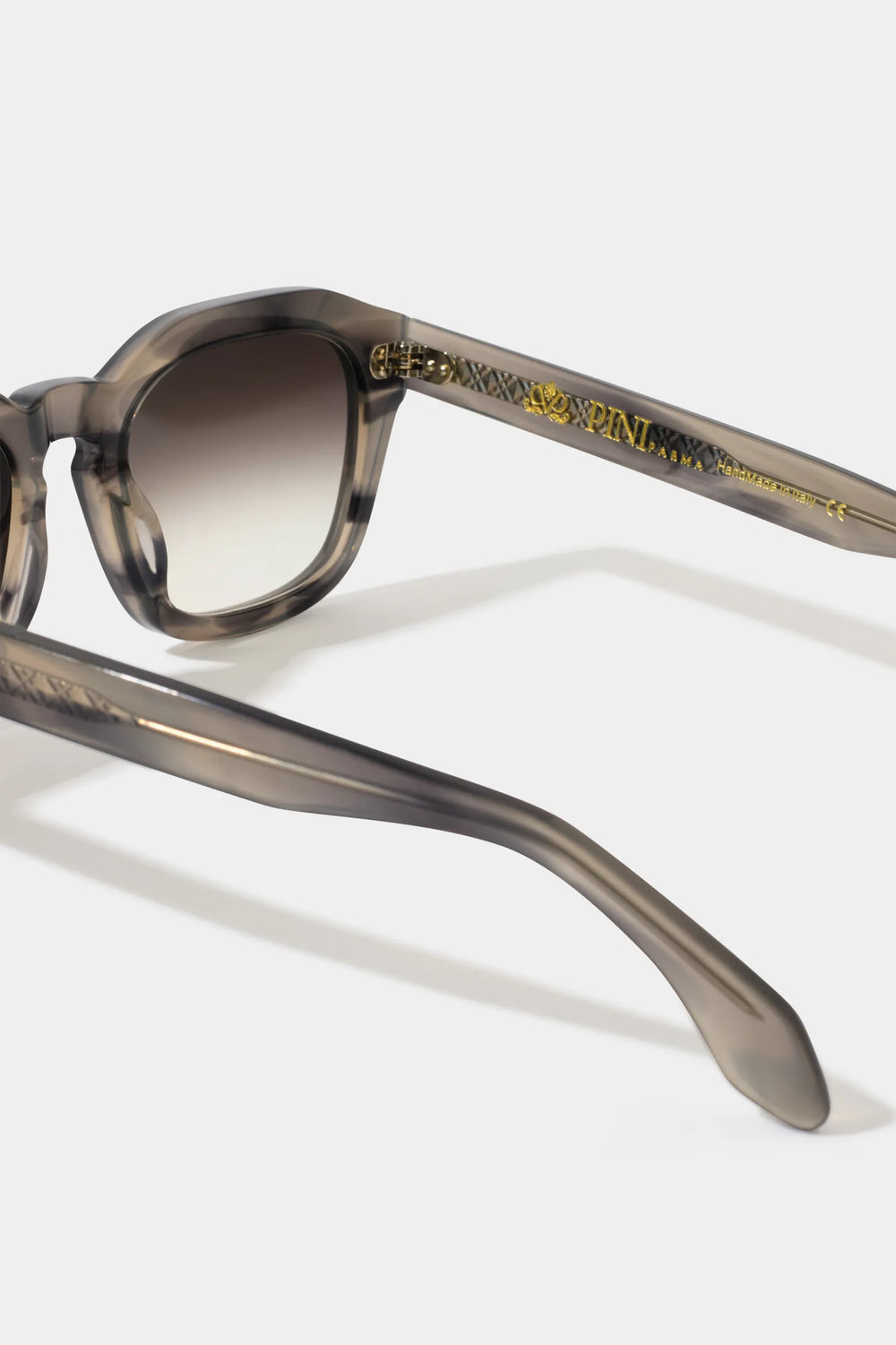 grey ischia sunglasses, men's grey sunglasses, italian sunglasses men, grey acetate sunglasses, luxury men's sunglasses, elegant men's eyewear, refined grey sunglasses, tailored italian sunglasses, premium men's sunglasses, sophisticated italian eyewear, timeless grey sunglasses, upscale men's sunglasses, classic italian sunglasses, italian craftsmanship eyewear, premium grey sunglasses, refined men's sunglasses