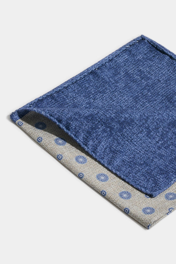 Blue and gray patterned fabric on a white background