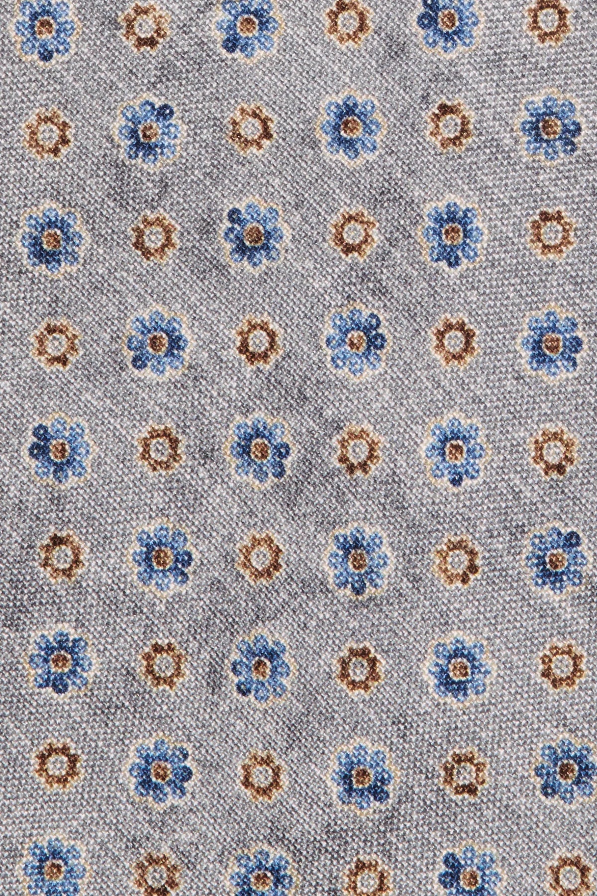 Patterned fabric with blue and brown flowers on a gray background