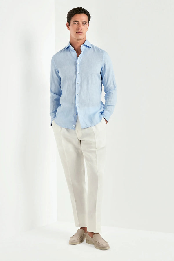 light blue linen shirt, men's blue linen shirt, italian linen shirt, garment dyed linen shirt, luxury men's shirt, elegant men's shirt, refined linen shirt, tailored blue shirt, premium italian shirt, sophisticated men's summer shirt, timeless italian shirt, upscale men's linen shirt, classic light blue linen shirt, italian craftsmanship shirt, premium men's linen shirt, refined italian linen shirt