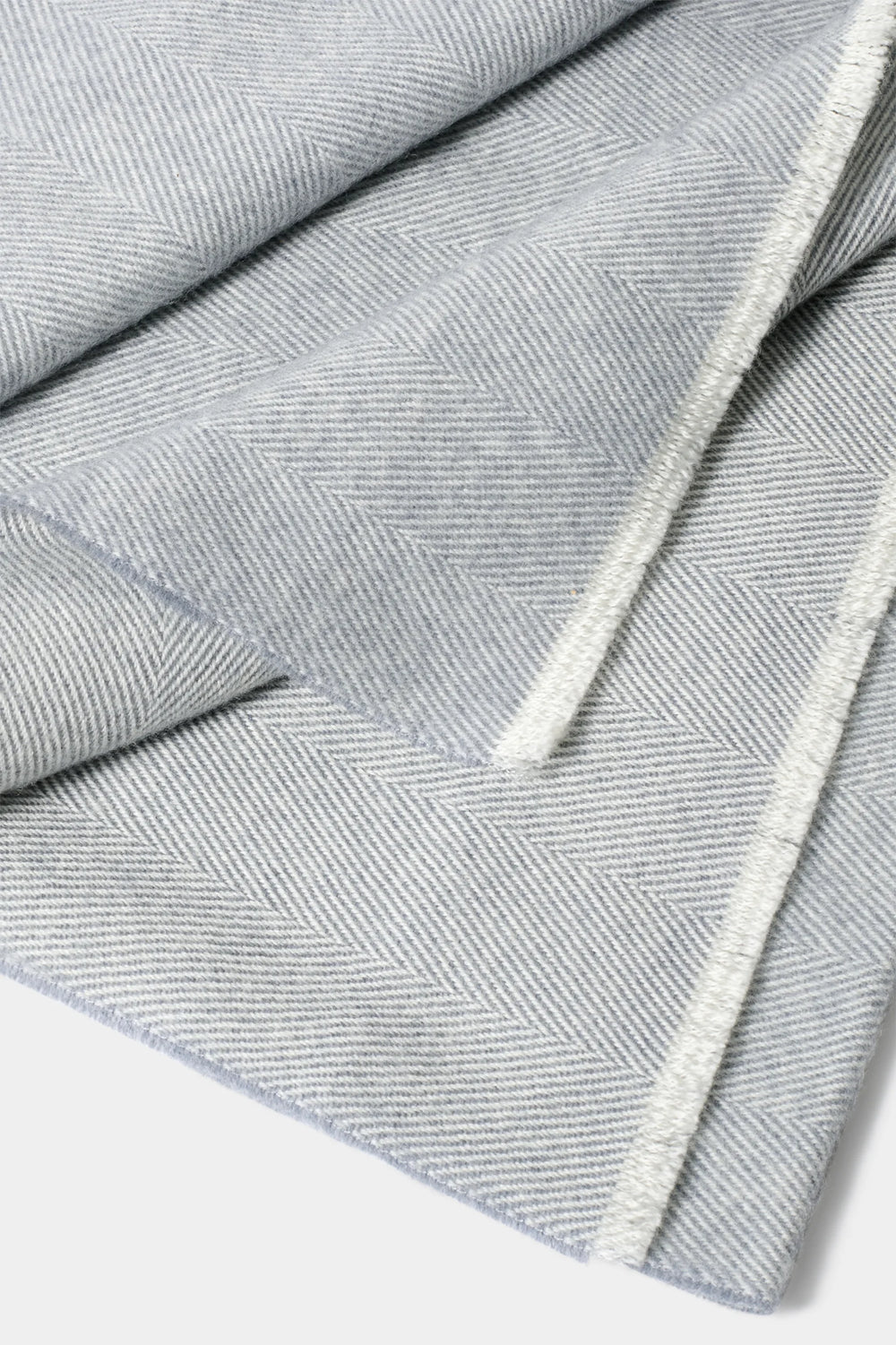 light grey herringbone scarf, men's herringbone scarf, italian wool scarf, light grey wool scarf, luxury men's scarf, elegant men's scarf, refined herringbone scarf, tailored light grey scarf, premium italian scarf, sophisticated men's scarf, timeless italian wool scarf, upscale men's scarf, classic light grey scarf, italian craftsmanship scarf, premium men's wool scarf, refined italian herringbone scarf