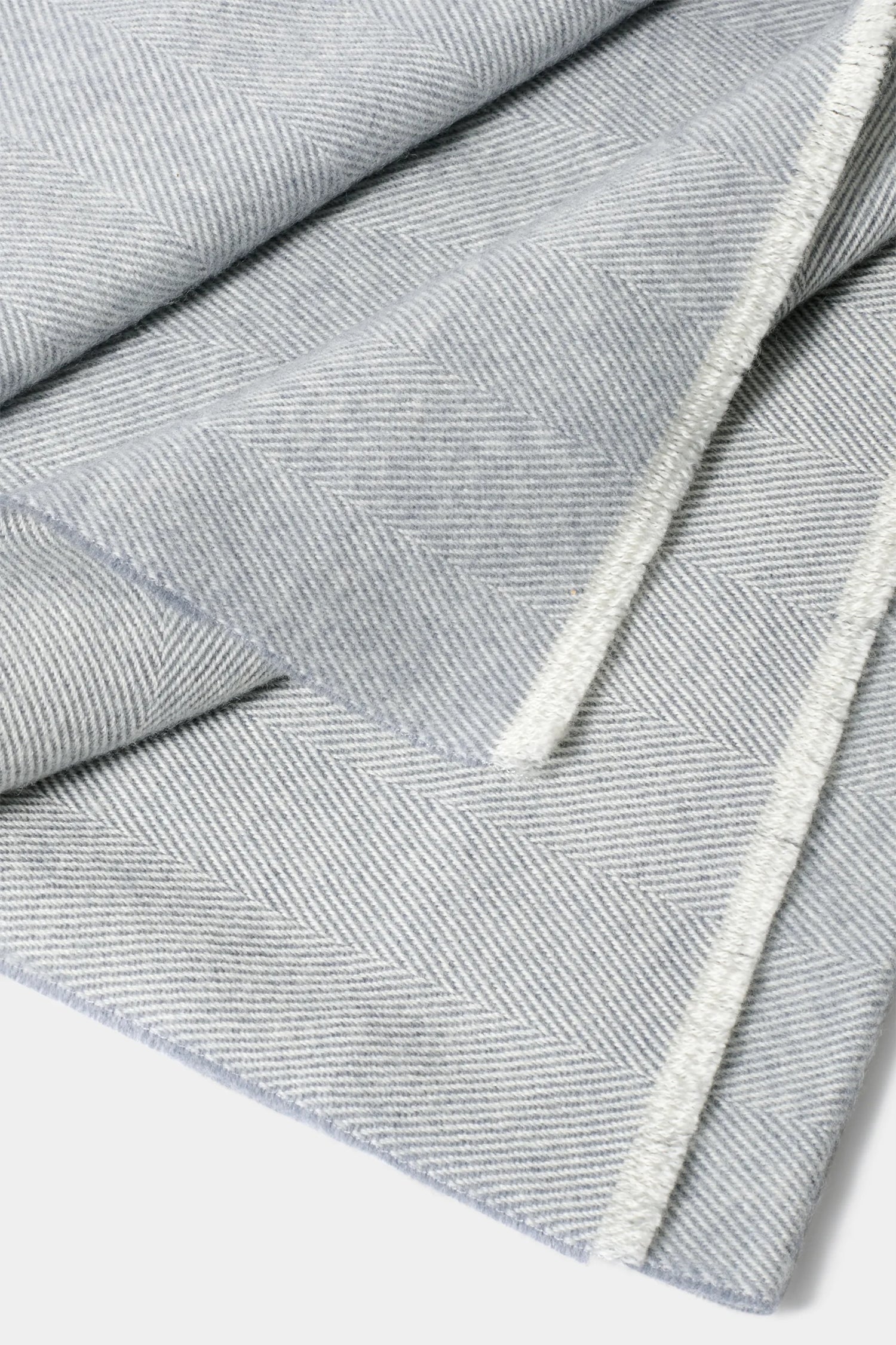 light grey herringbone scarf, men's herringbone scarf, italian wool scarf, light grey wool scarf, luxury men's scarf, elegant men's scarf, refined herringbone scarf, tailored light grey scarf, premium italian scarf, sophisticated men's scarf, timeless italian wool scarf, upscale men's scarf, classic light grey scarf, italian craftsmanship scarf, premium men's wool scarf, refined italian herringbone scarf