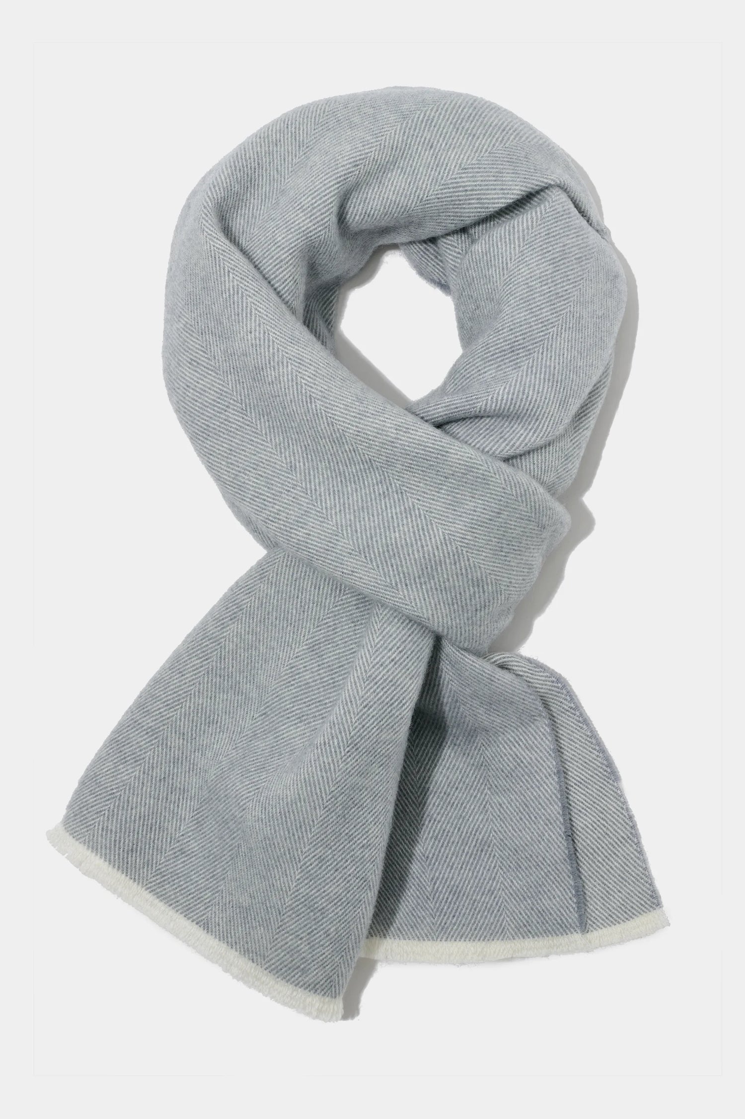 light grey herringbone scarf, men's herringbone scarf, italian wool scarf, light grey wool scarf, luxury men's scarf, elegant men's scarf, refined herringbone scarf, tailored light grey scarf, premium italian scarf, sophisticated men's scarf, timeless italian wool scarf, upscale men's scarf, classic light grey scarf, italian craftsmanship scarf, premium men's wool scarf, refined italian herringbone scarf