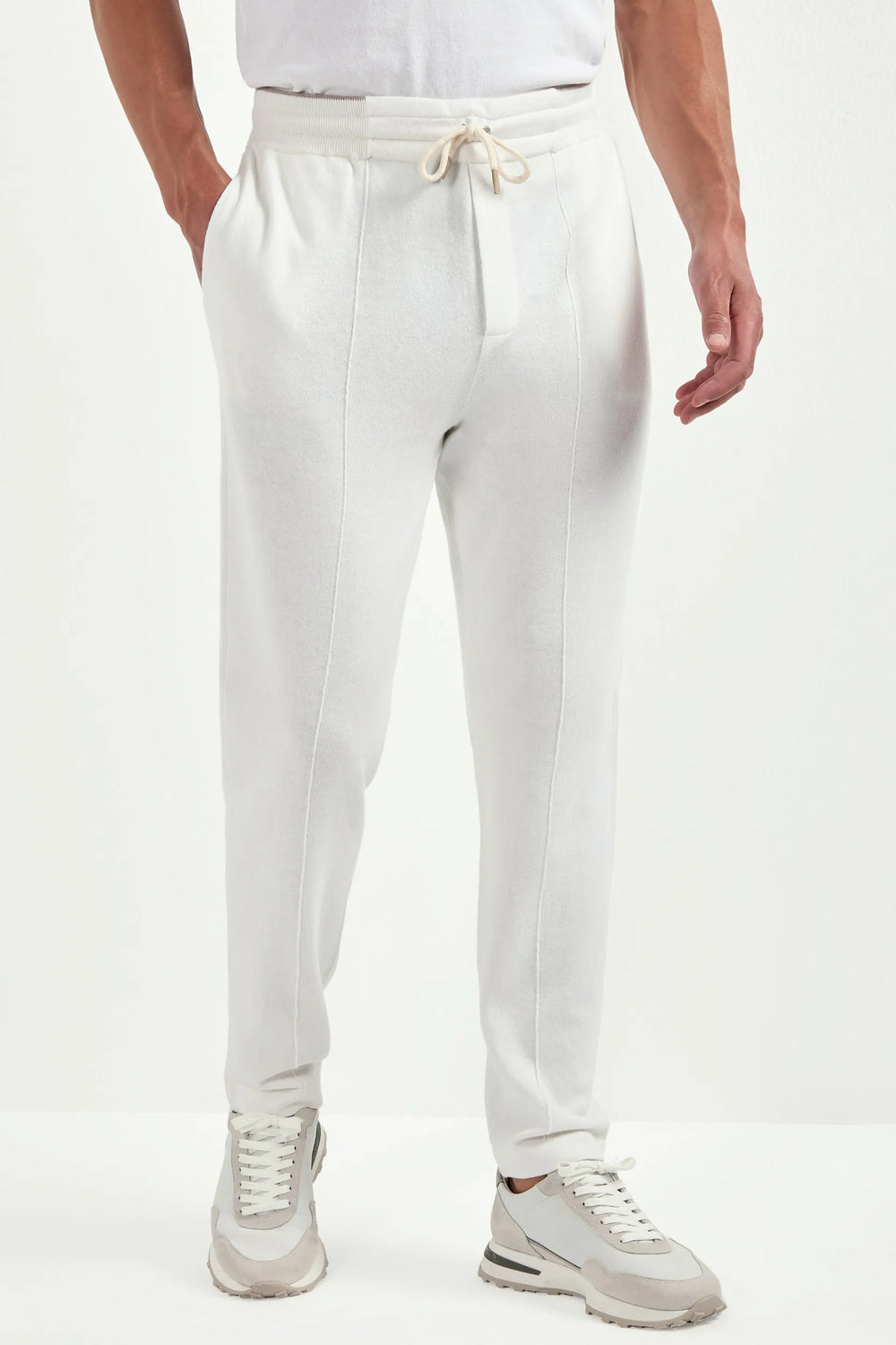 off white jogger pants, men's cashmere joggers, italian cashmere pants, off white knit joggers, luxury men's pants, elegant men's joggers, refined cashmere joggers, tailored off white joggers, premium italian pants, sophisticated men's knit pants, timeless italian joggers, upscale men's cashmere pants, classic off white joggers, italian craftsmanship joggers, premium men's cashmere blend pants, refined italian joggers