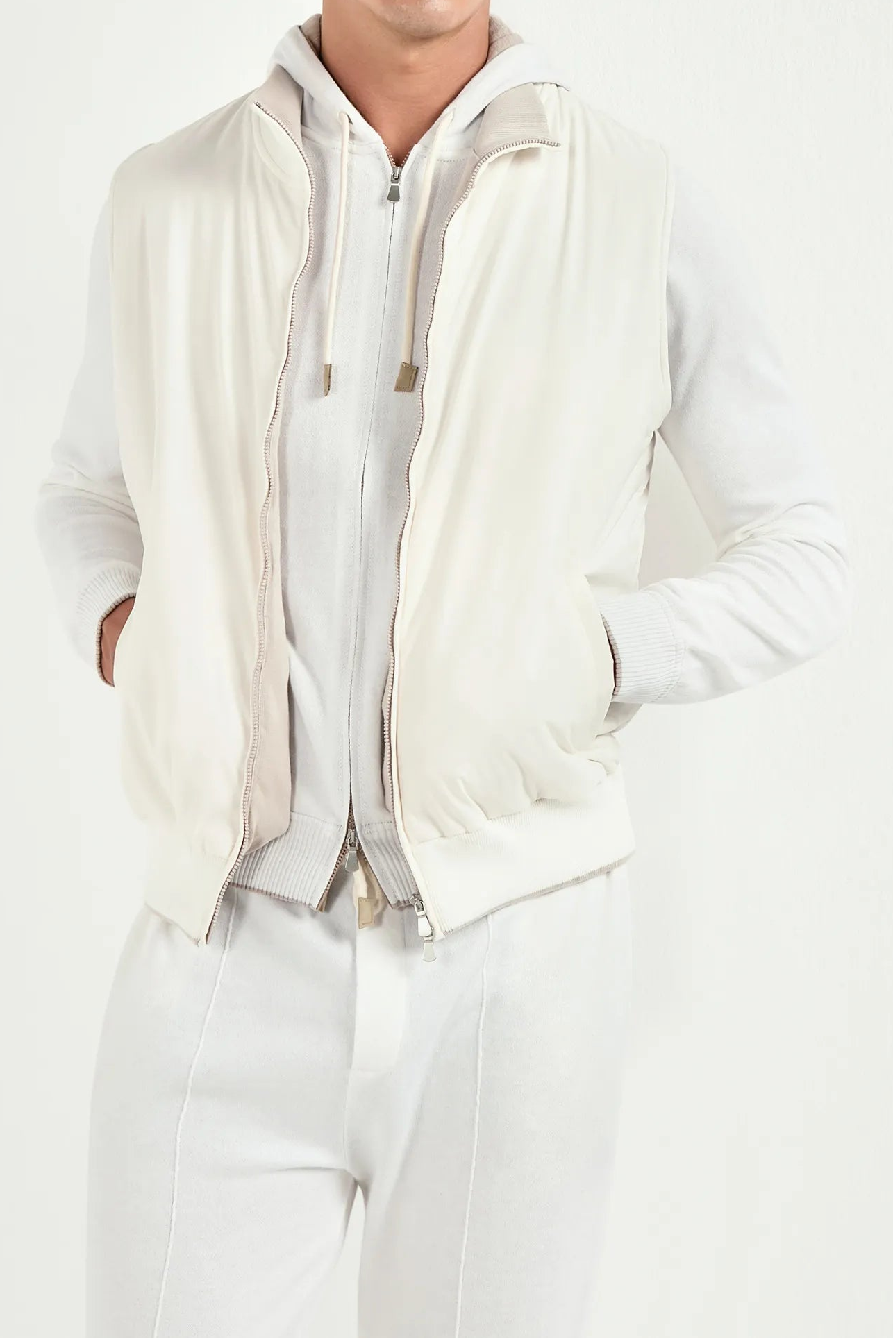 off white nylon vest, men's off white vest, italian nylon vest, off white sleeveless jacket, luxury men's vest, elegant men's outerwear, refined nylon vest, tailored off white vest, premium italian vest, sophisticated men's vest, timeless italian vest, upscale men's nylon vest, classic off white vest, italian craftsmanship vest, premium men's sleeveless vest, refined italian nylon vest