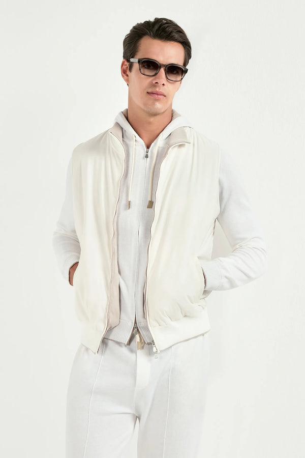 off white nylon vest, men's off white vest, italian nylon vest, off white sleeveless jacket, luxury men's vest, elegant men's outerwear, refined nylon vest, tailored off white vest, premium italian vest, sophisticated men's vest, timeless italian vest, upscale men's nylon vest, classic off white vest, italian craftsmanship vest, premium men's sleeveless vest, refined italian nylon vest