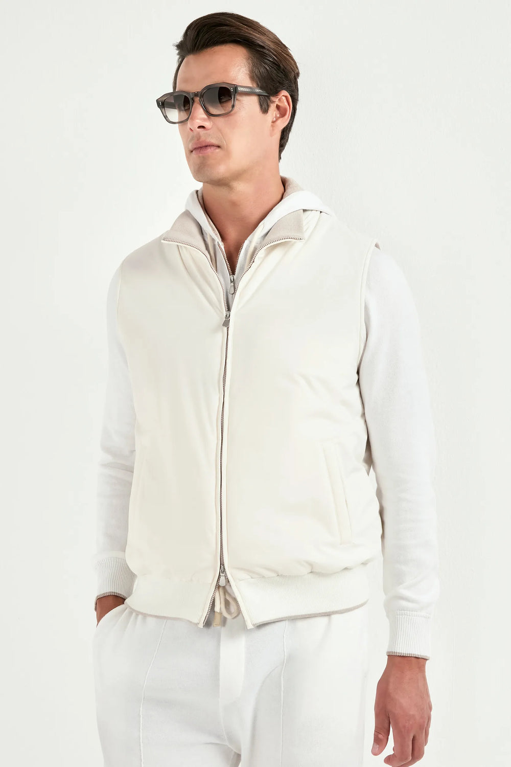 off white nylon vest, men's off white vest, italian nylon vest, off white sleeveless jacket, luxury men's vest, elegant men's outerwear, refined nylon vest, tailored off white vest, premium italian vest, sophisticated men's vest, timeless italian vest, upscale men's nylon vest, classic off white vest, italian craftsmanship vest, premium men's sleeveless vest, refined italian nylon vest