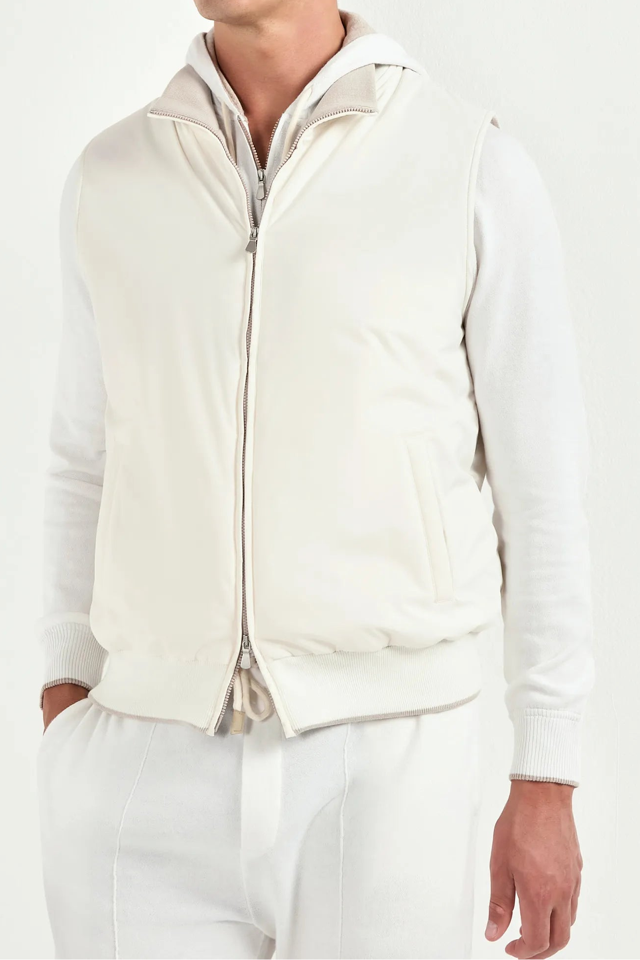 off white nylon vest, men's off white vest, italian nylon vest, off white sleeveless jacket, luxury men's vest, elegant men's outerwear, refined nylon vest, tailored off white vest, premium italian vest, sophisticated men's vest, timeless italian vest, upscale men's nylon vest, classic off white vest, italian craftsmanship vest, premium men's sleeveless vest, refined italian nylon vest