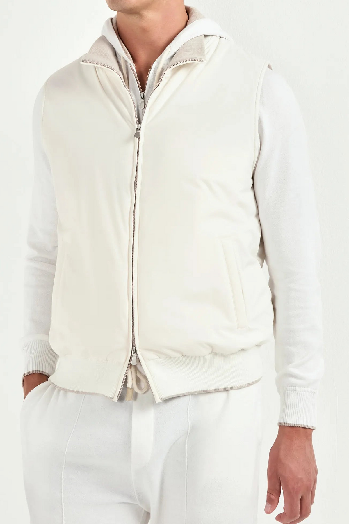 off white nylon vest, men's off white vest, italian nylon vest, off white sleeveless jacket, luxury men's vest, elegant men's outerwear, refined nylon vest, tailored off white vest, premium italian vest, sophisticated men's vest, timeless italian vest, upscale men's nylon vest, classic off white vest, italian craftsmanship vest, premium men's sleeveless vest, refined italian nylon vest