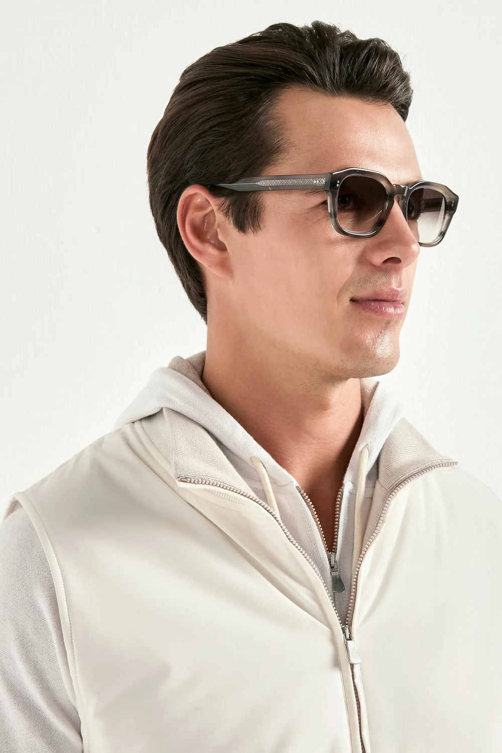 off white nylon vest, men's off white vest, italian nylon vest, off white sleeveless jacket, luxury men's vest, elegant men's outerwear, refined nylon vest, tailored off white vest, premium italian vest, sophisticated men's vest, timeless italian vest, upscale men's nylon vest, classic off white vest, italian craftsmanship vest, premium men's sleeveless vest, refined italian nylon vest