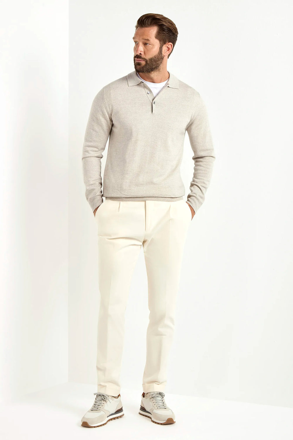 greige merino wool polo, italian style, made in italy, lightweight merino polo, 100% merino wool polo, luxury knit polo, elegant merino shirt, refined menswear polo, premium italian knitwear, smart casual polo, versatile layering polo, fine merino polo, tailored merino polo, breathable wool polo, soft merino knit polo, upscale polo shirt, italian craftsmanship polo, polished knit polo, classic greige merino polo, timeless italian knit