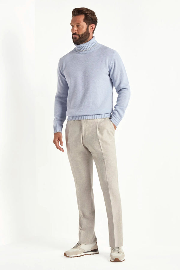 light blue wool turtleneck, italian style, made in italy, fine wool turtleneck, luxury wool sweater, elegant winter knitwear, refined menswear turtleneck, premium italian sweater, versatile layering turtleneck, tailored wool turtleneck, breathable winter sweater, soft wool knitwear, upscale wool sweater, italian craftsmanship turtleneck, polished winter knit, classic light blue turtleneck, timeless italian sweater, sophisticated wool knit, cozy winter wool sweater, lightweight wool turtleneck